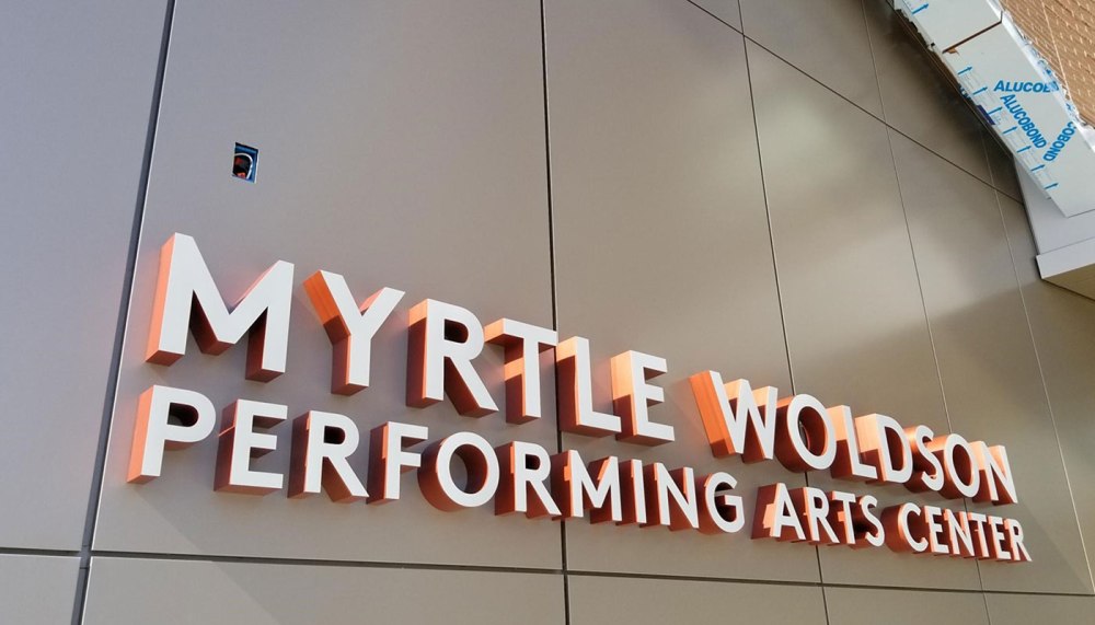 Custom dimensional lettering installed as part of the exterior building identification package at the new Myrtle Woldson Performing Arts Center.