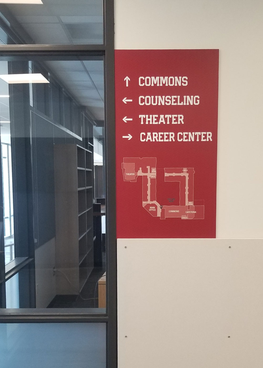 The Juanita High School sign package features a diverse range of interior signage needs - from dimensional to ADA/regulatory to flat panel wayfinding.